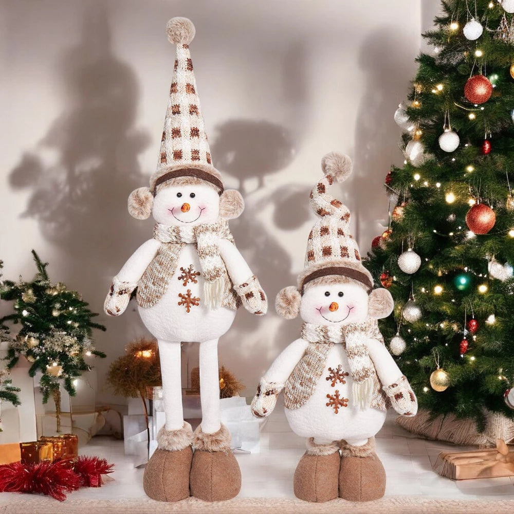 Stovintis sniego senis ant ištraukiamų kojelių