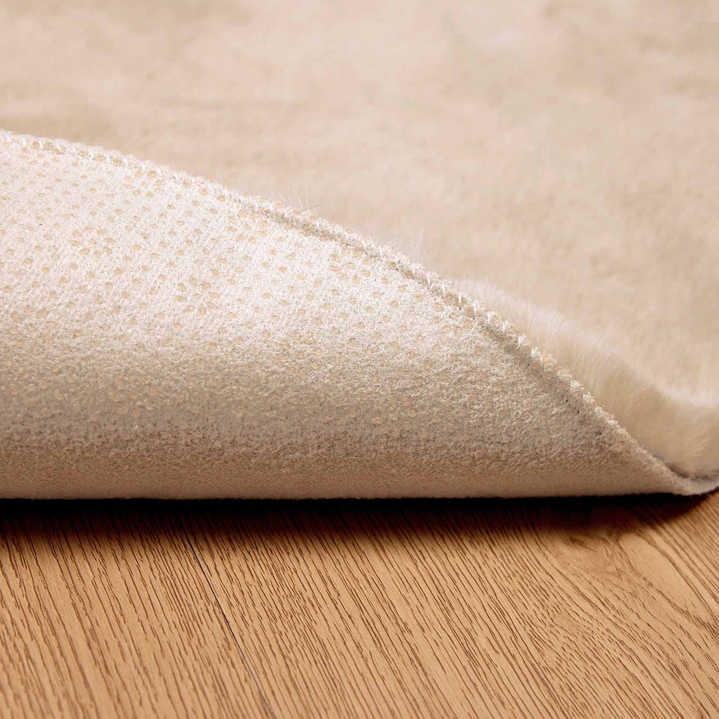 Dirbtinio triušio kailio kilimas Olite Taupe Ø 80 cm